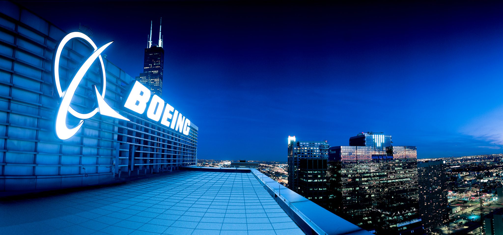 Boeing posts largest-ever quarterly loss; warns of cuts in 737 output